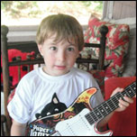 Cameron on guitar